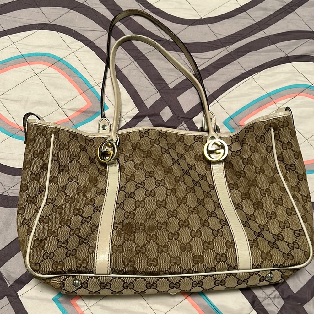Brown and white Gucci bag